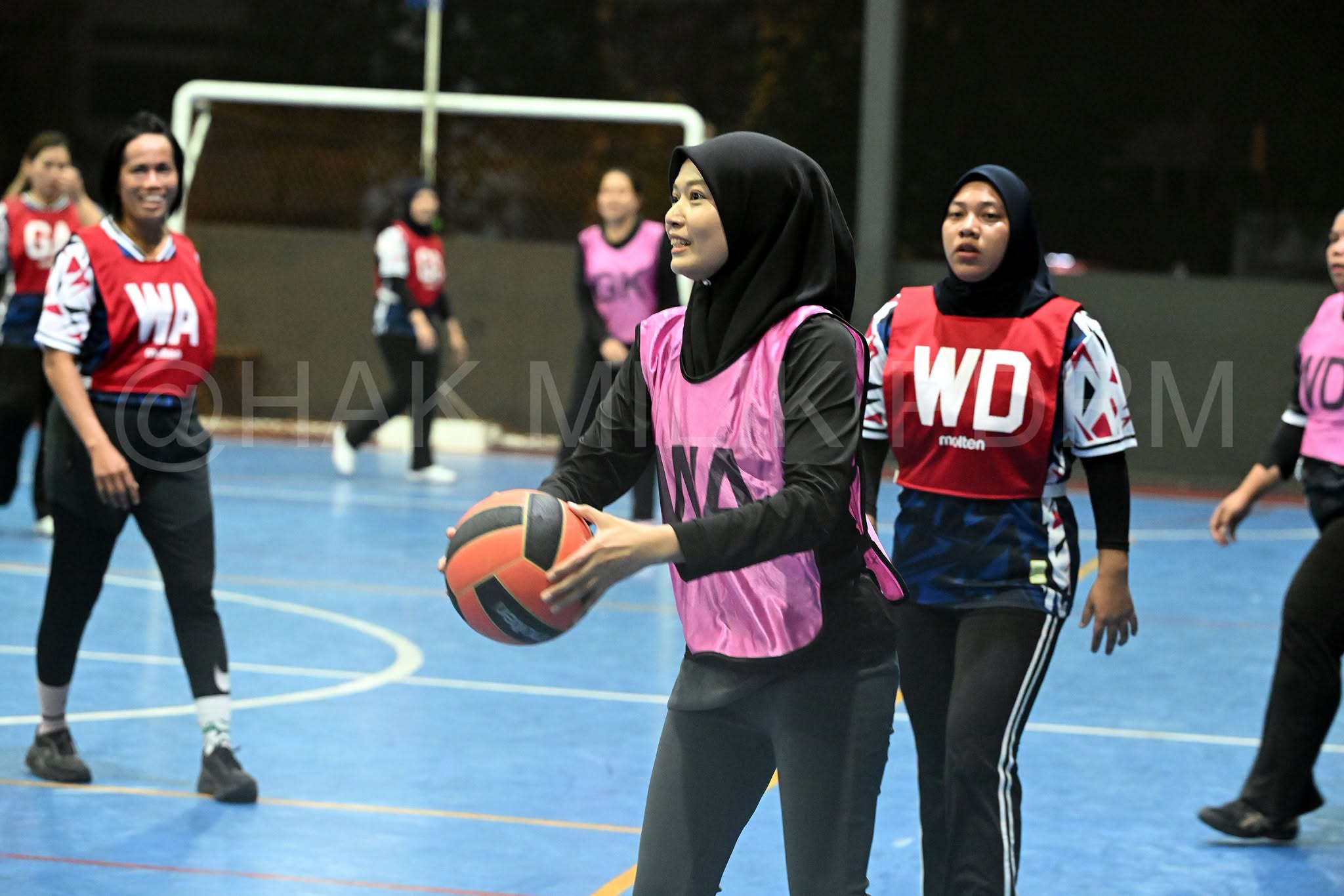 May be an image of American football, basketball, volleyball and text