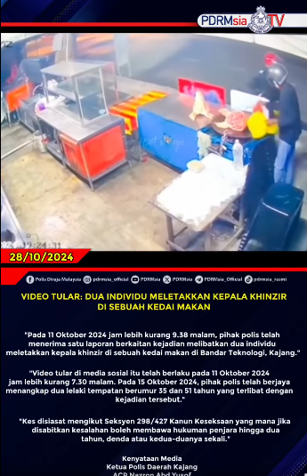 Video Tular Dua Individu Meletakkan Kepala Khinzir Di Sebuah Kedai Makan